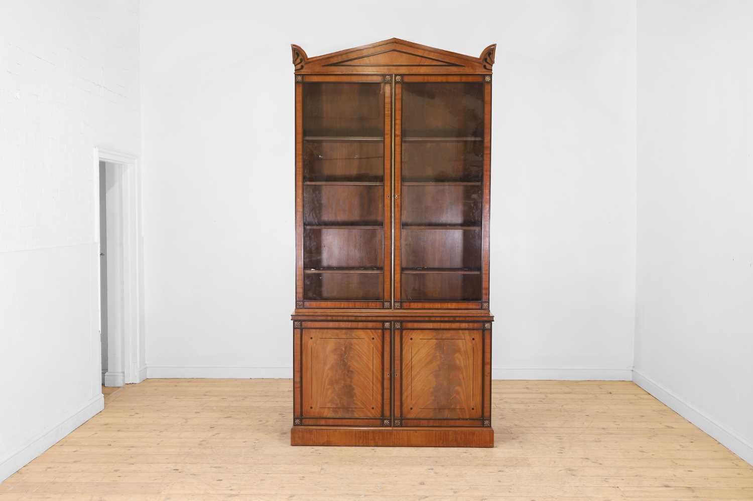 Lot 84 - A Regency-style mahogany bookcase