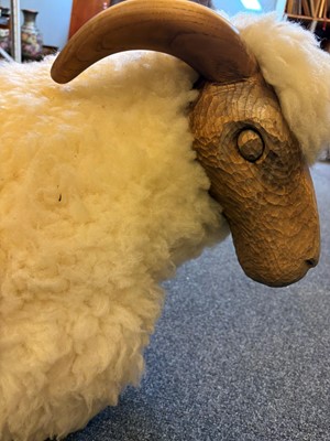 Lot 532 - A 'Goring Hotel' carved oak and wool sheep stool