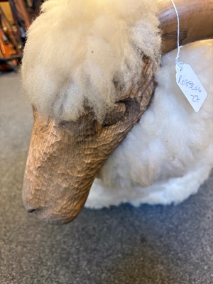 Lot 532 - A 'Goring Hotel' carved oak and wool sheep stool