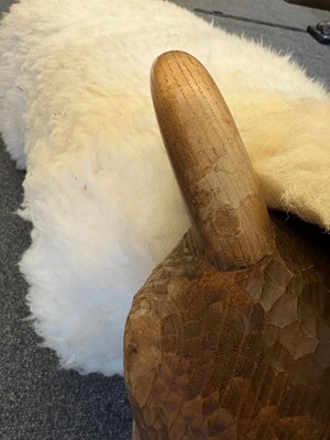 Lot 532 - A 'Goring Hotel' carved oak and wool sheep stool