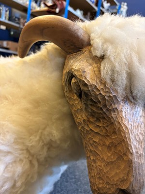 Lot 532 - A 'Goring Hotel' carved oak and wool sheep stool