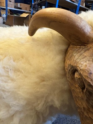 Lot 532 - A 'Goring Hotel' carved oak and wool sheep stool