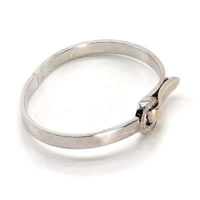 Lot 136 - An 18ct gold diamond 'Bond' bangle, by Asprey
