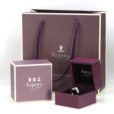Lot 243 - An 18ct gold diamond 'Bond' ring, by Asprey