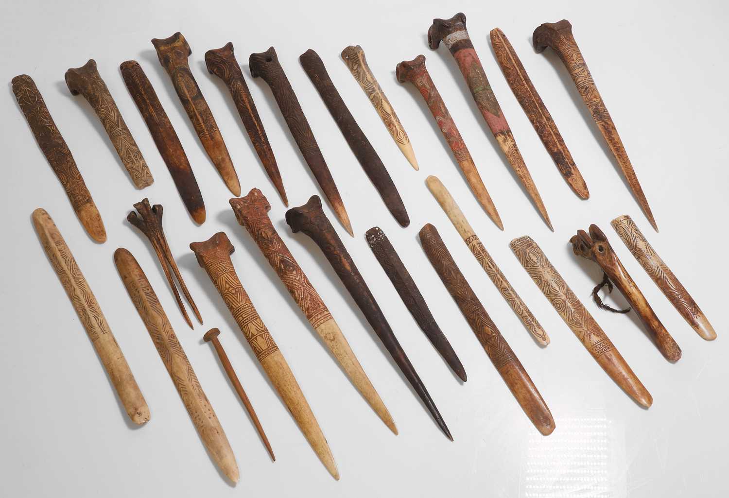 Lot 280 - A collection of cassowary bone objects