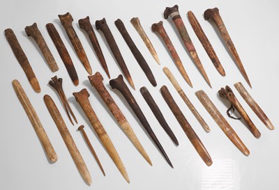 Lot 280 - A collection of cassowary bone objects