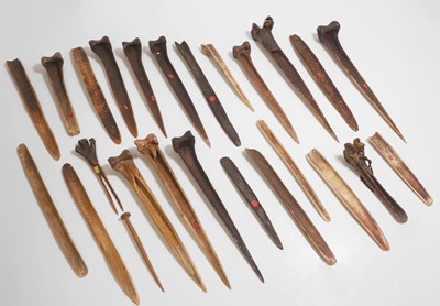 Lot 280 - A collection of cassowary bone objects