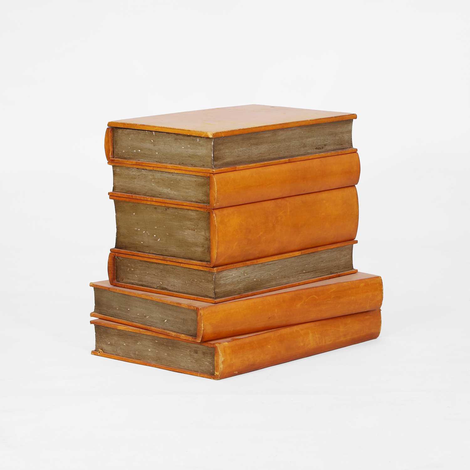 Lot 260 - An occasional table in the form of a stack of books