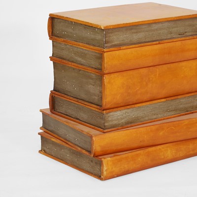 Lot 260 - An occasional table in the form of a stack of books