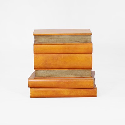 Lot 260 - An occasional table in the form of a stack of books