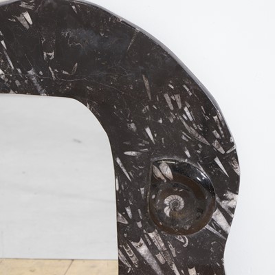 Lot 150 - A fossil marble mirror