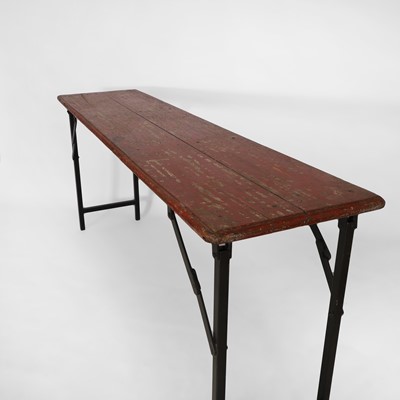 Lot 162 - A folding trestle table