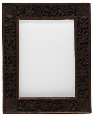 Lot 438 - A carved hardwood frame