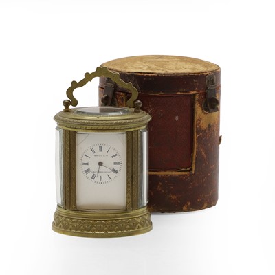 Lot 386 - A cased brass carriage timepiece