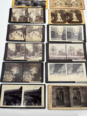 Lot 427 - A hand held wooden stereoscopic viewer