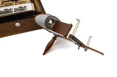 Lot 427 - A hand held wooden stereoscopic viewer