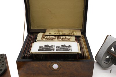Lot 427 - A hand held wooden stereoscopic viewer