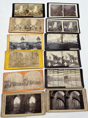 Lot 427 - A hand held wooden stereoscopic viewer