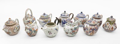 Lot 180 - A collection of Chinese and Japanese export teapots