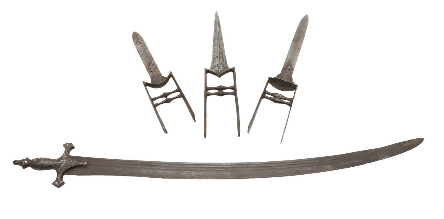 Lot 126 - A group of three Katar daggers