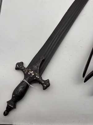 Lot 126 - A group of three Katar daggers