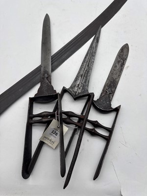 Lot 126 - A group of three Katar daggers