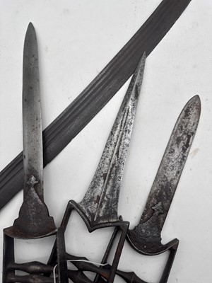 Lot 126 - A group of three Katar daggers