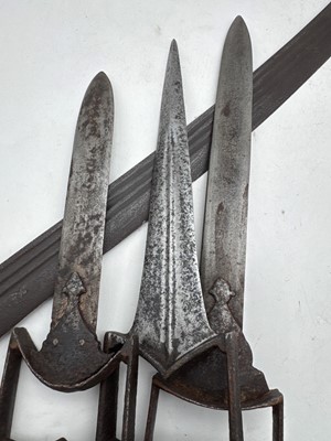 Lot 126 - A group of three Katar daggers