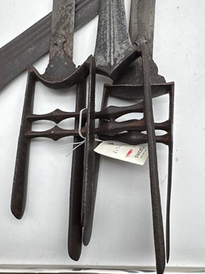 Lot 126 - A group of three Katar daggers