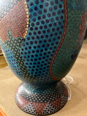 Lot 34 - A pair of polychrome cloisonné enamel lamps
