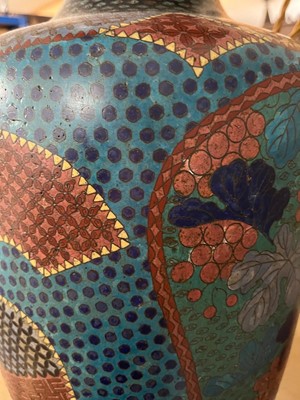 Lot 34 - A pair of polychrome cloisonné enamel lamps