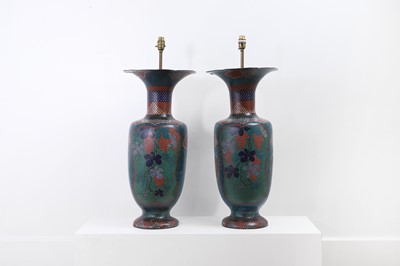Lot 34 - A pair of polychrome cloisonné enamel lamps