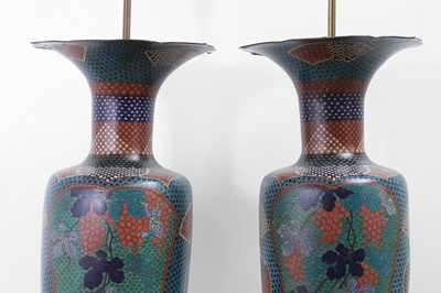 Lot 34 - A pair of polychrome cloisonné enamel lamps