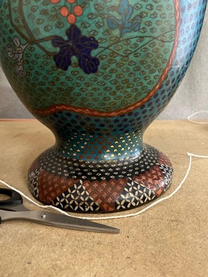 Lot 34 - A pair of polychrome cloisonné enamel lamps