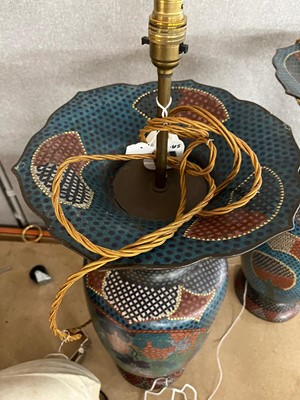 Lot 34 - A pair of polychrome cloisonné enamel lamps