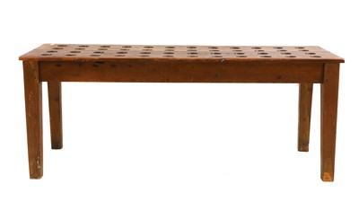 Lot 744 - A pine wine bottle table