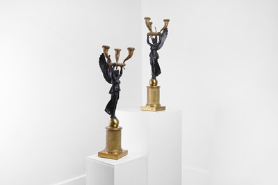 Lot 81 - A pair of Empire ormolu and patinated bronze candelabra