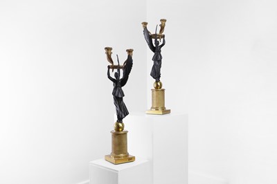 Lot 81 - A pair of Empire ormolu and patinated bronze candelabra