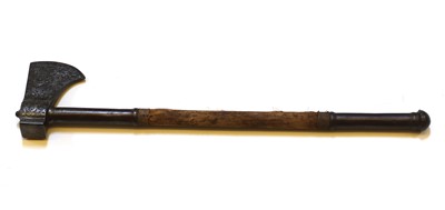 Lot 99 - A Persian tabazin steel saddle axe