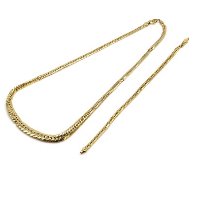 Lot 305 - A graduated flat curb link chain necklace and a similar bracelet