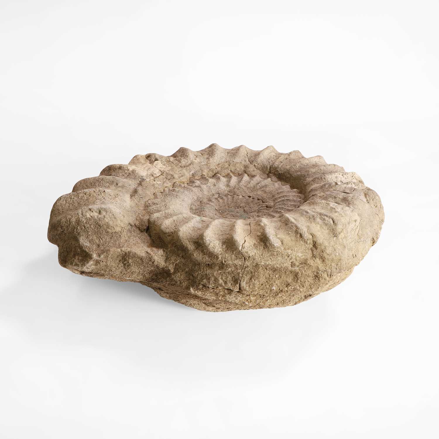 Lot 134 - A limestone ammonite fossil