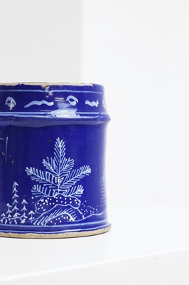 Lot 4 - An English delft chinoiserie mug