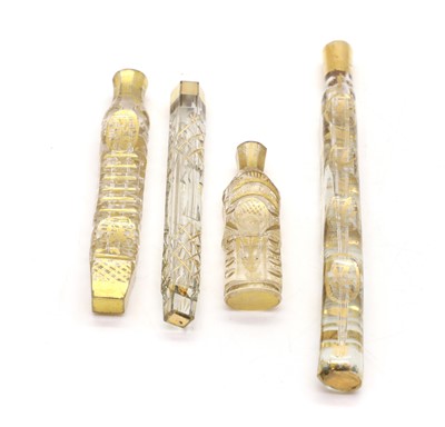 Lot 55 - Four cut glass and gilt tear dropper scent bottles