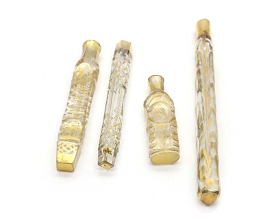 Lot 55 - Four cut glass and gilt tear dropper scent bottles