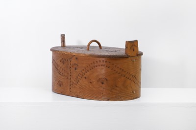 Lot 398 - A bentwood tine box and cover