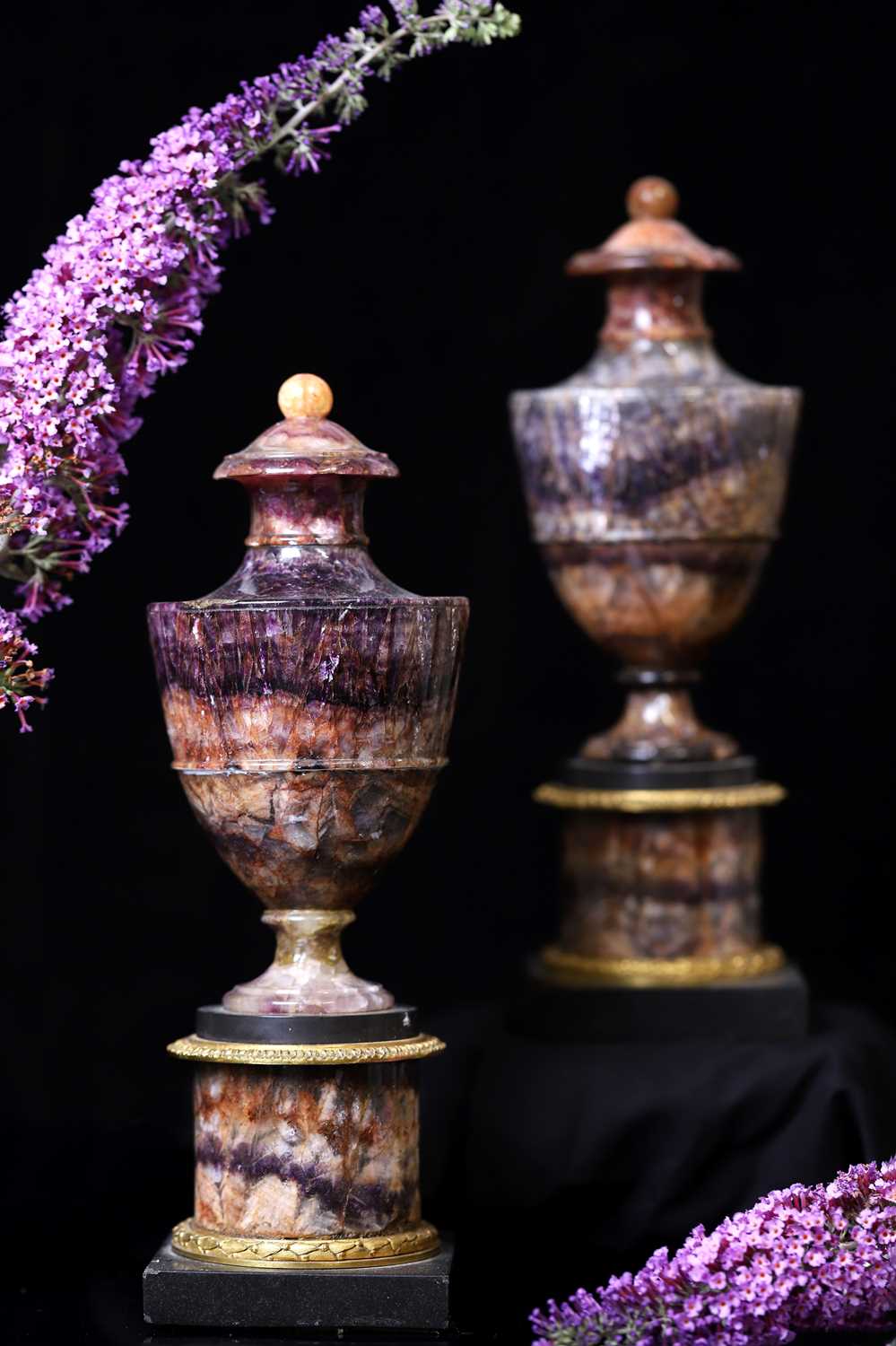Lot A pair of George III Derbyshire fluorspar Blue John garniture urns