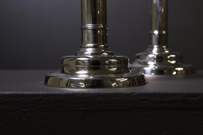 Lot 306 - A pair of George III paktong telescopic candlesticks