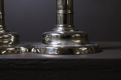 Lot 306 - A pair of George III paktong telescopic candlesticks