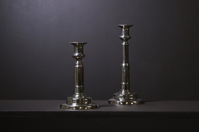 Lot 306 - A pair of George III paktong telescopic candlesticks