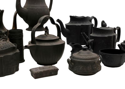 Lot 383 - A collection of Wedgwood black basalt teapots and tea wares